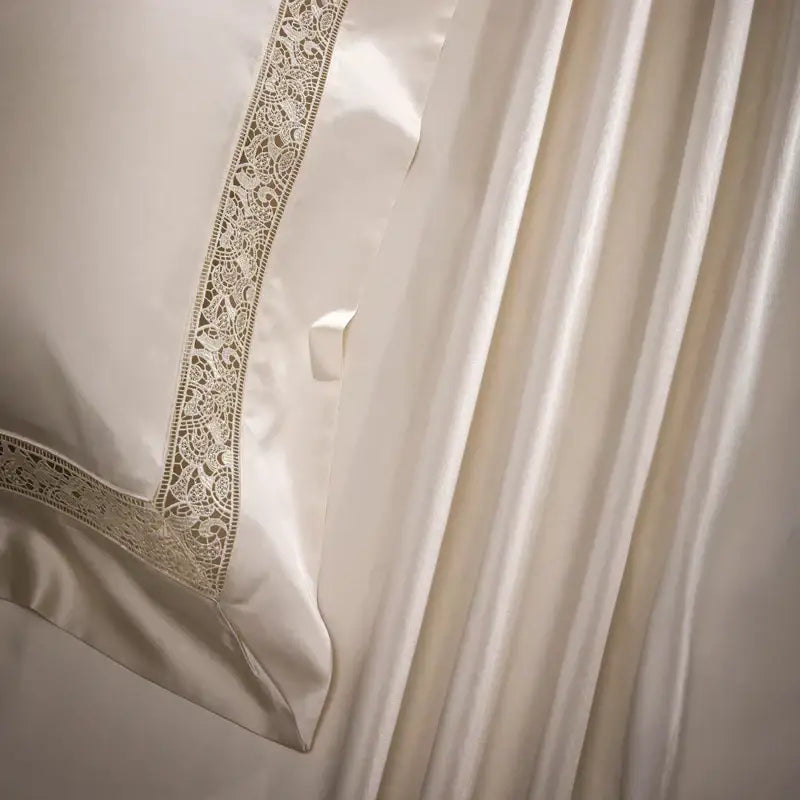 Cream-colored satin pillowcase with beige lace trim from decorbites damask lyocell cotton bedding set