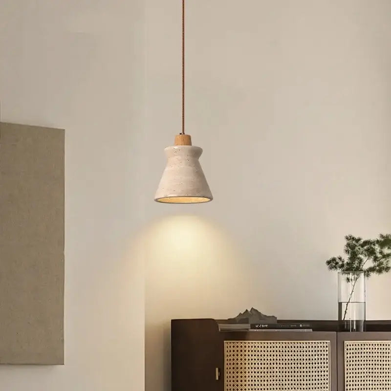 Minimalist concrete pendant light with warm glow and wood accent in led wood yellow decorbites pendant light bedroom