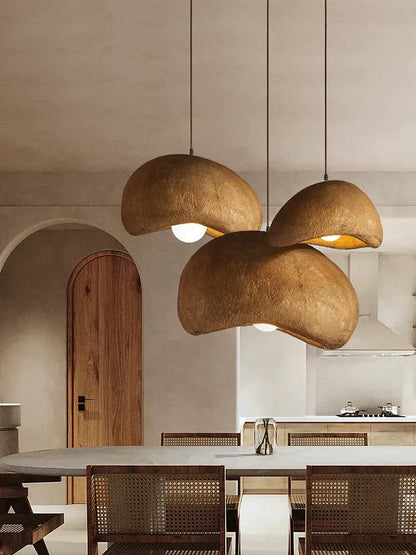 Three hanging cream style cloud pendant lamps with textured earthy brown dome shades for dining room decorbites cream style