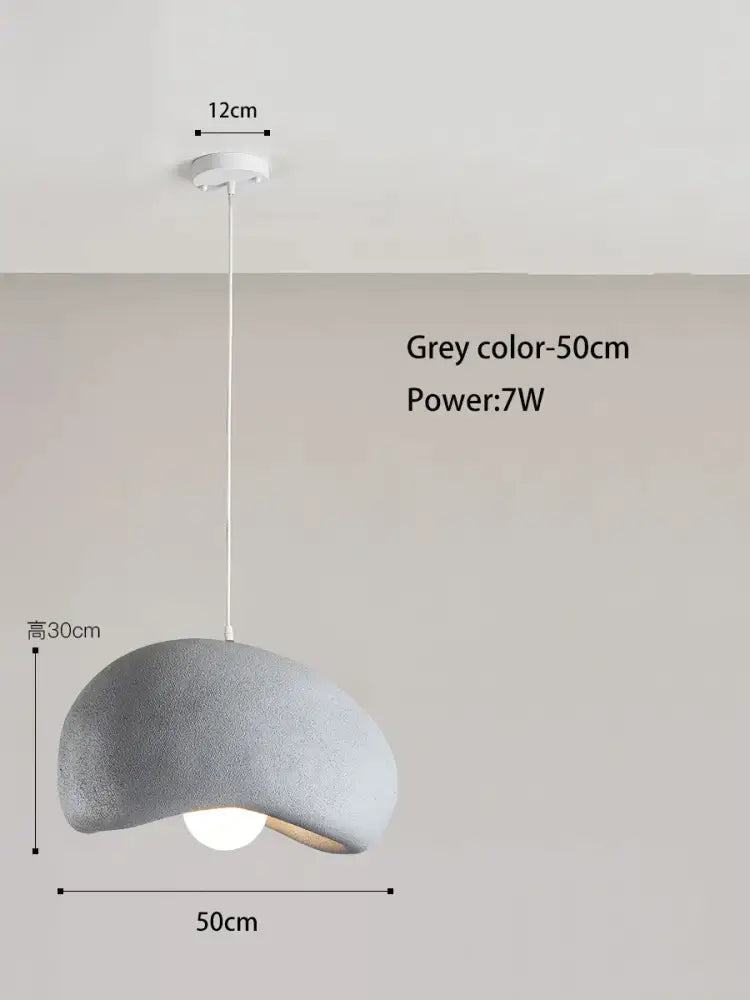 A modern grey cream style cloud pendant lamp with textured shade and white cord for dining room decorbites cream style