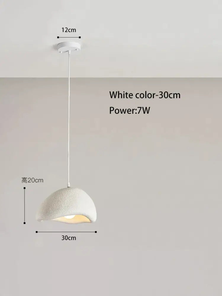 Cream style cloud pendant lamp with white ceramic textured dome shade and sleek white cord for dining room decorbites cream style