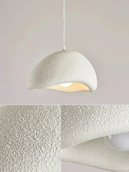 A modern cream style cloud pendant lamp with textured matte finish and curved dome shape for dining room decorbites cream style