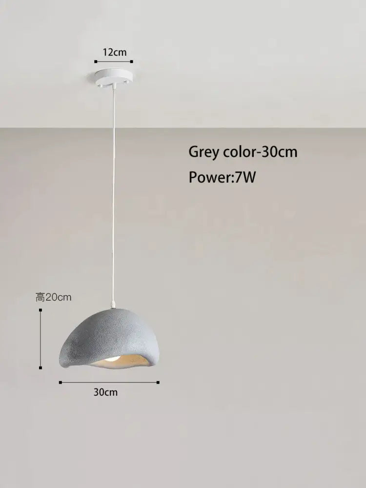 Grey concrete pendant lamp with smooth dome shade and white cord from decorbites cream style cloud collection for dining room decor