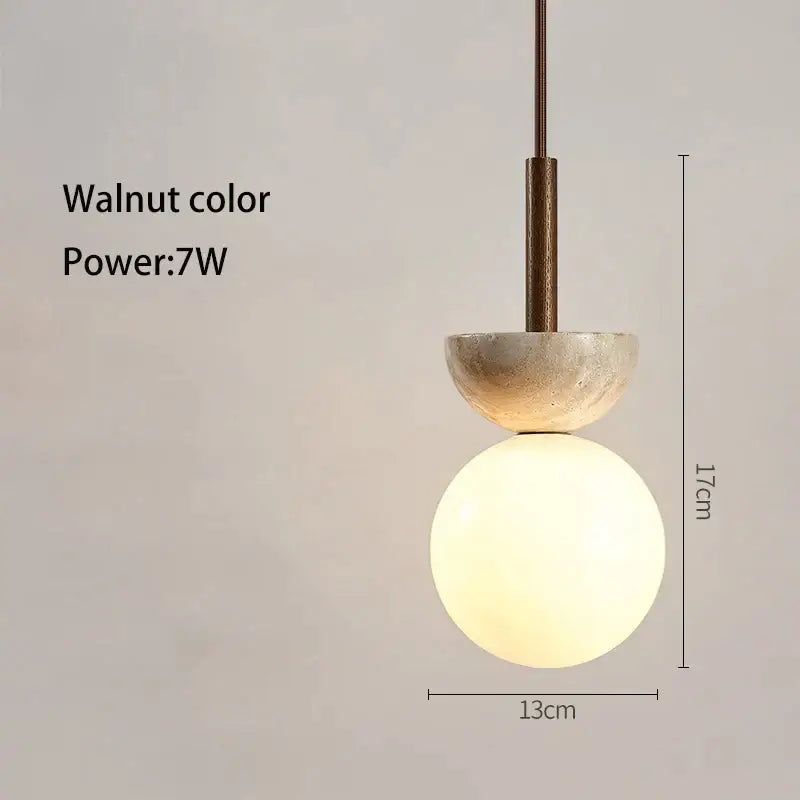 Walnut-colored pendant lamp with matte upper dome and frosted glass globe for cream style nordic bedroom decorbites cream style