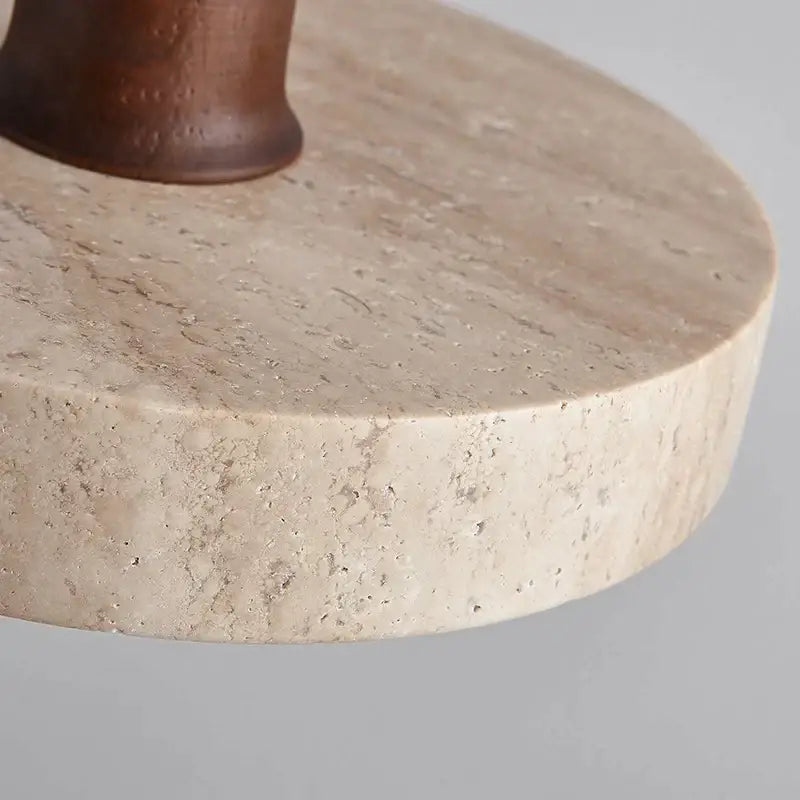 Beige stone pedestal with dark brown wooden base complementing decorbites cream style wood walnut pendant light design