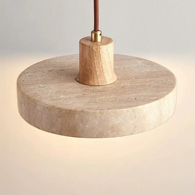 Beige stone pendant light with wooden base and brass hardware in decorbites cream style wood walnut and concrete design