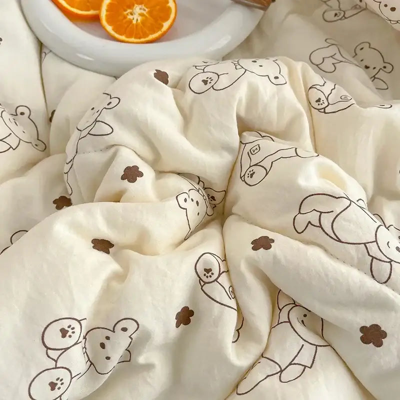 Cream teddy bear breathable double gauze quilt in cream color with quilted bears and brown paw prints for bedroom decorbites breathable double use