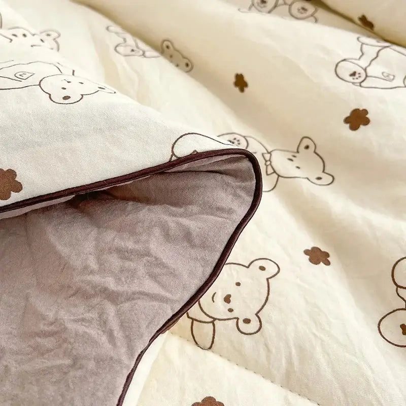 Cream teddy bear breathable double gauze quilt with embroidered patterns and soft gray lining for bedroom bedding decorbites breathable double gauze