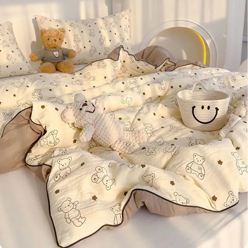 Cream teddy bear double layered soya fibre quilt with embroidered patterns and brown border for bedroom comforter use