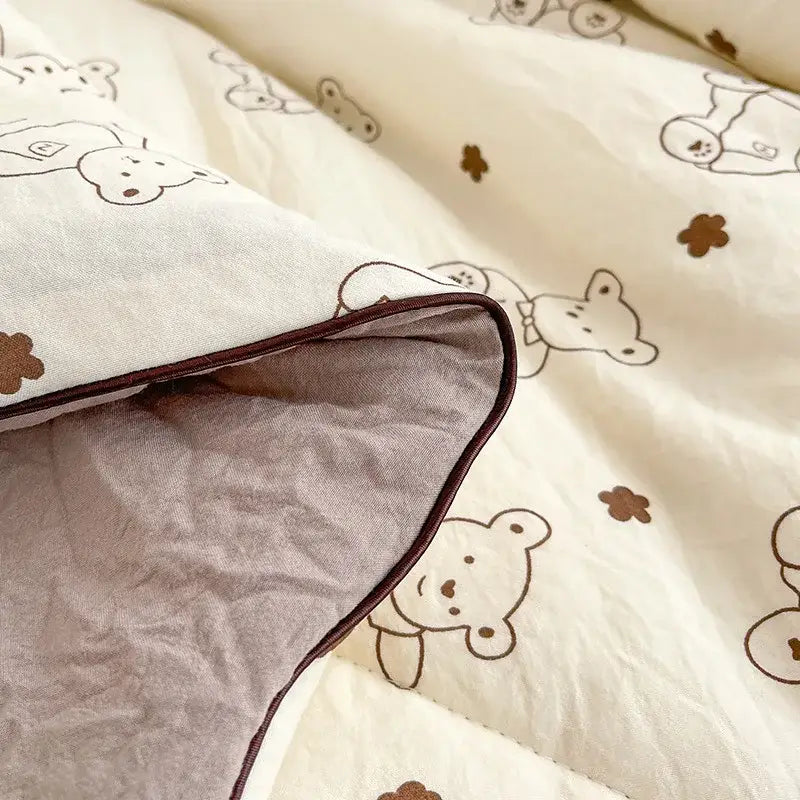 Cream teddy bear double layered soya fibre quilt with embroidered brown patterns and soft gray inner lining for bedroom comfort
