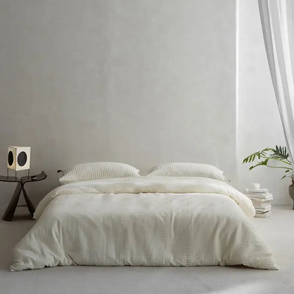 Cream textured cotton foam yarn bedding set with a subtle ribbed pattern for bedroom comfort and style
