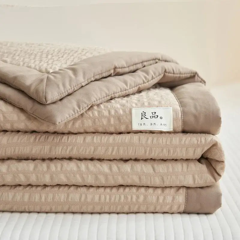 Beige quilted cream textured ice cream air bubble summer quilt with soft textured surface and subtle stitching decorbites ice cream