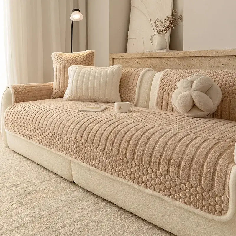 Beige jacquard knit sofa cover with plush quilted pattern and soft cozy fabric for living room use
