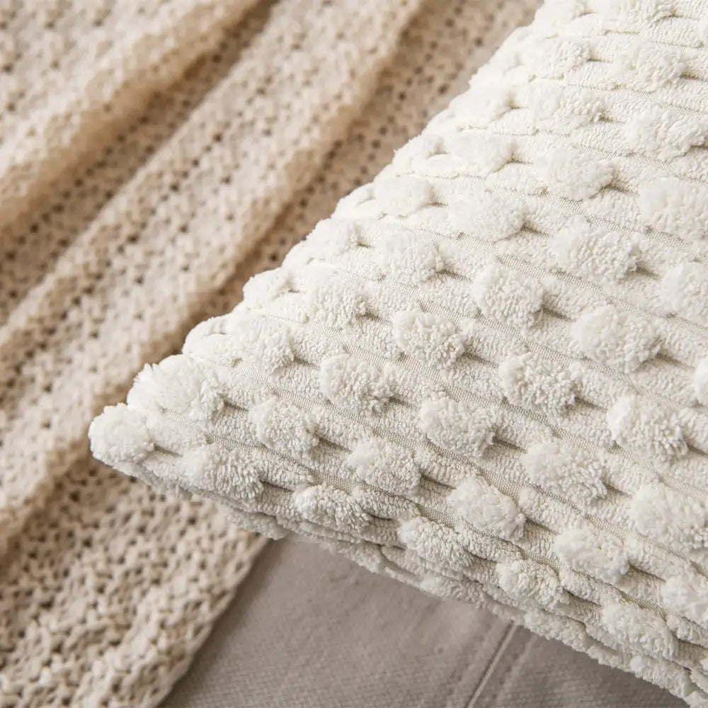 Cream textured knit decorative pillow cover with pom-pom pattern for living room decorbites decorative pillow cover