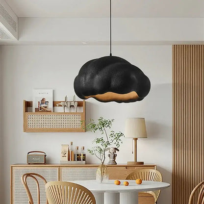 Black cloud-shaped pendant chandelier with textured matte finish and warm glow for decorbites cream wabi dining room light