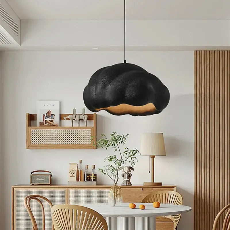 Black cloud-shaped pendant chandelier with textured matte finish and warm glow for decorbites cream wabi dining room light