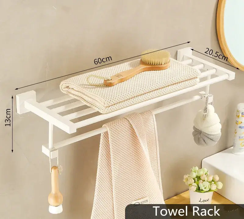 Cream white bathroom set featuring a white plastic towel rack with horizontal bars and a flat storage shelf above