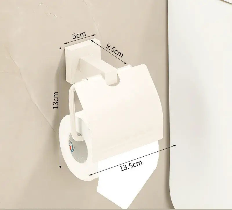 White plastic toilet paper holder with integrated cover in cream white bathroom set with towel rack and storage shelf