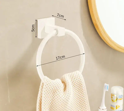 Cream white bathroom set towel rack featuring a white plastic wall-mounted towel ring with square base and circular loop