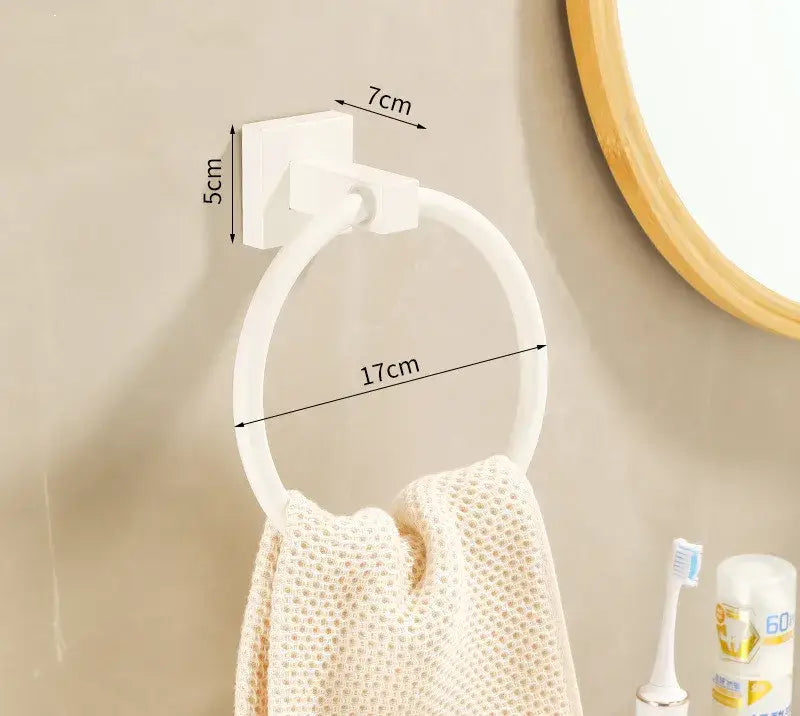 Cream white bathroom set towel rack featuring a white plastic wall-mounted towel ring with square base and circular loop