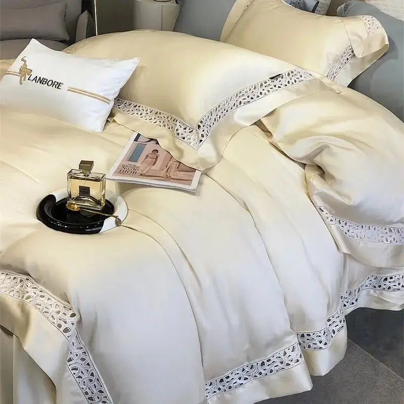 Cream-colored satin bedding set with delicate white lace trim made of soft eucalyptus fiber for luxury decorbites eucalyptus fiber use