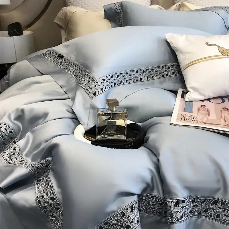 Light blue satin bedding set with intricate black lace trim made from eucalyptus fiber for luxury bedroom decorbites eucalyptus fiber