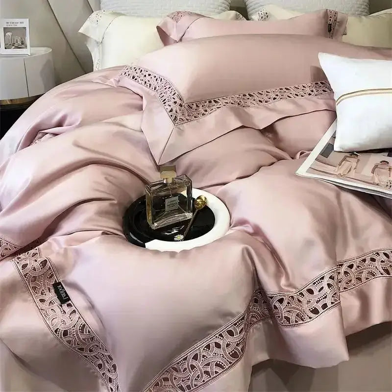 Pink satin bedding set with delicate lace trim made of eucalyptus fiber by decorbites for luxury bedroom decor