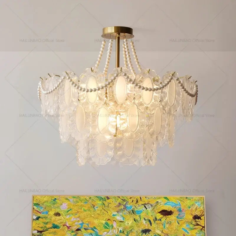 Elegant cream wind crystal chandelier with gold-toned fixture, white glass panels, and pearl strands for living room decorbites cream wind