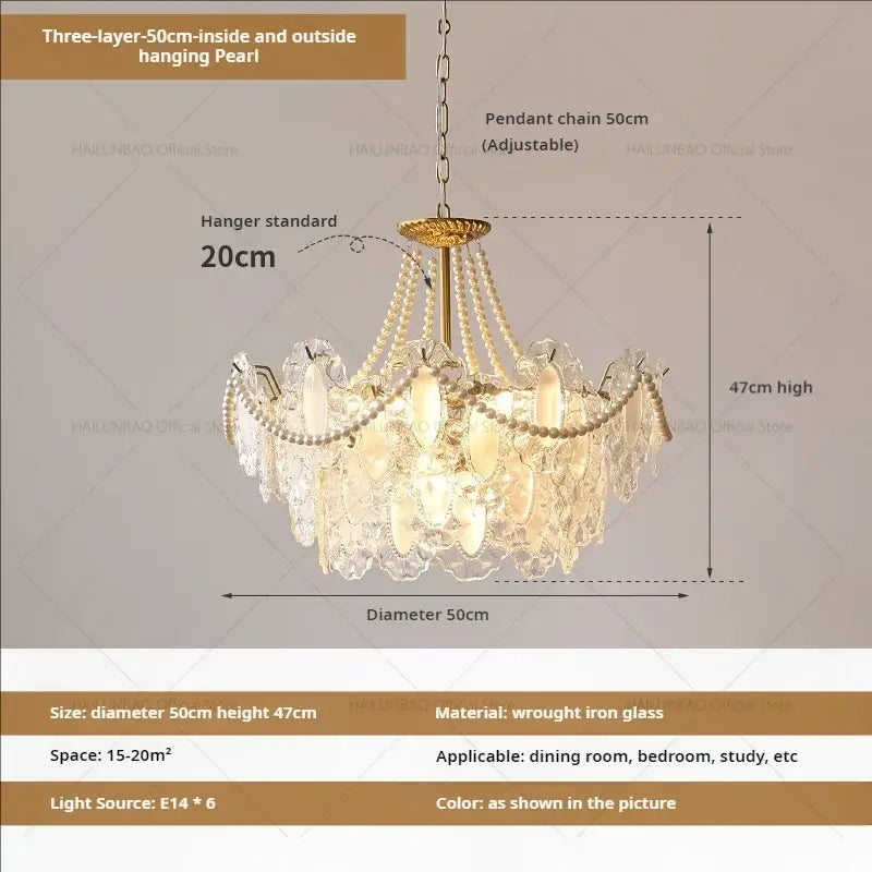 Cream wind crystal chandelier with three cascading glass tiers and pearl beads on a gold wrought iron frame