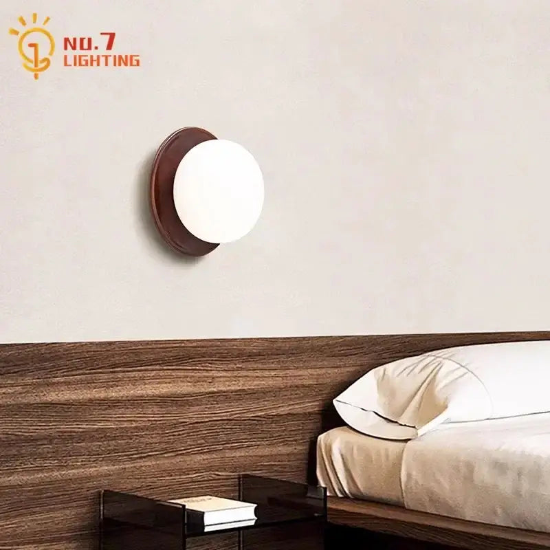 Cream wind dumplings wood and glass wall light with warm brown base and frosted globe by no7 lighting for bedroom decorbites cream wind wall light