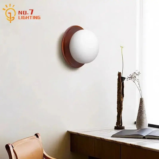 Cream wind dumplings wood and glass wall light with white frosted globe and warm brown base for bedroom decorbites cream wind