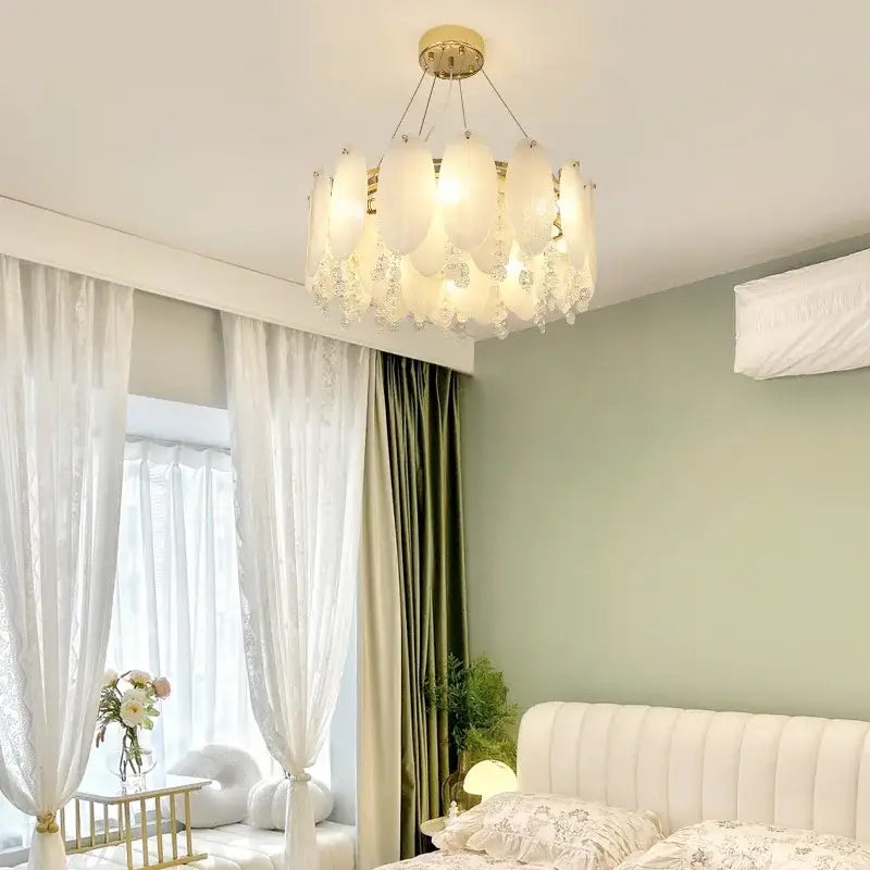 Decorbites cream wind led chandelier with white opal glass frosted design and gold-toned ceiling mount for bedroom decor