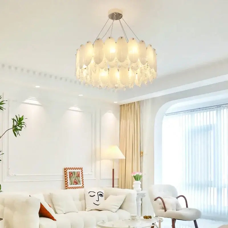 A cream wind led chandelier with tiered white opal glass shades in concentric circles for modern bedroom decorbites cream wind