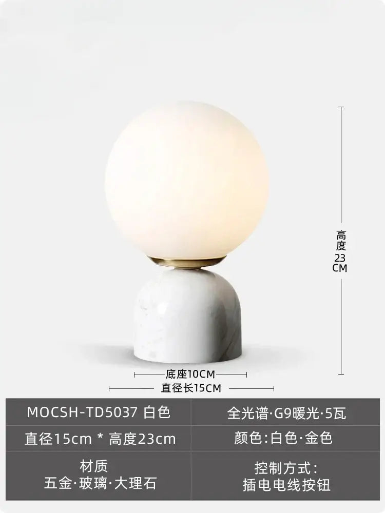 Cream wind marble table lamp with white marble base gold-toned collar and frosted spherical glass by decorbites cream wind