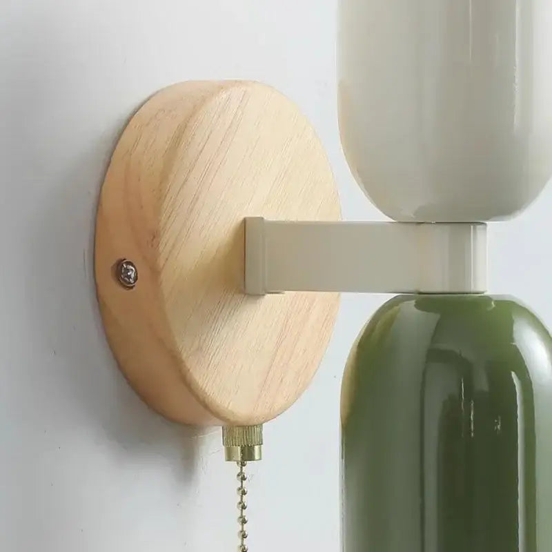 Modern wall lamp with light wood base cream zipper nordic off-white olive ceramic shades and brass pull chain for bedroom decorbites cream zipper