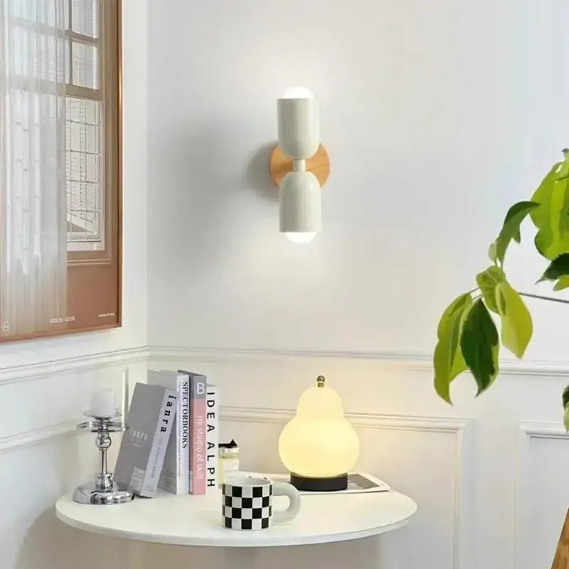 Modern white wall lamp with wooden circular base and two cylindrical lights cream zipper nordic decorbites cream zipper