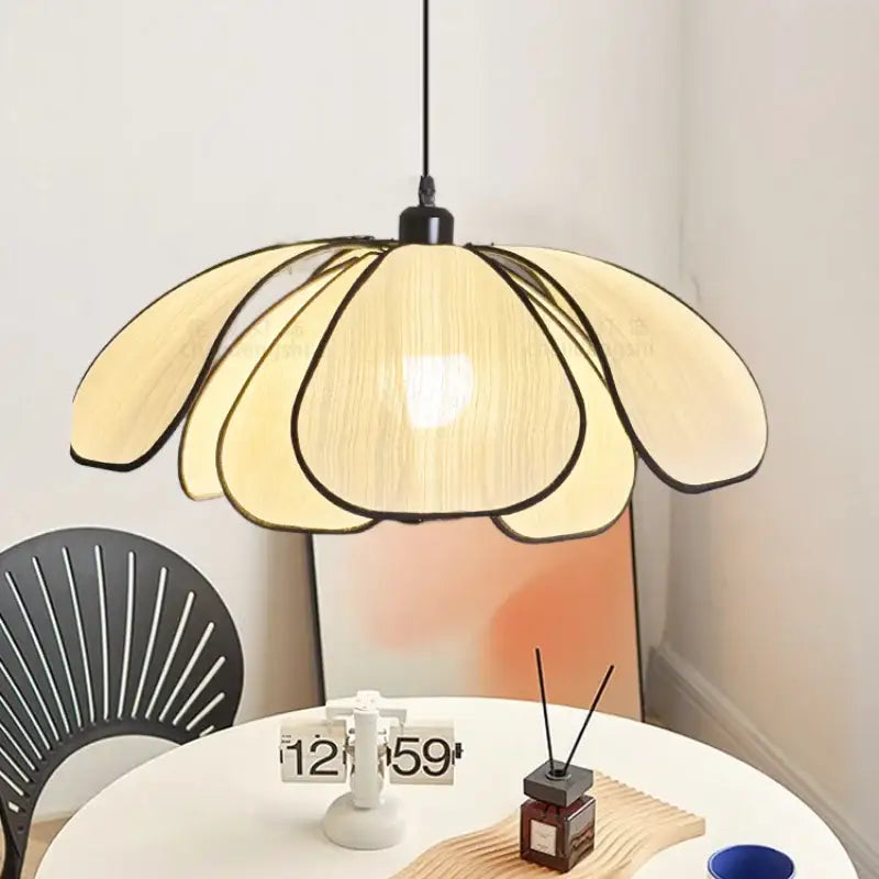 Creamy abaca fabric pendant light with flower-like woven design and black outlines for dining room decorbites creamy abaca