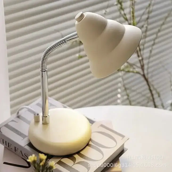 Creamy style desk lamp with a cream-colored matte shade and chrome flexible gooseneck for bedroom reading light decorbites creamy