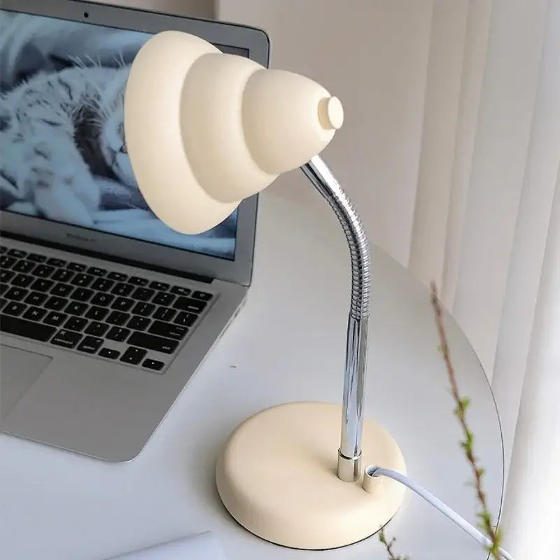 Cream-colored decorbites creamy style desk lamp with flexible chrome neck and tiered rounded shade for reading light