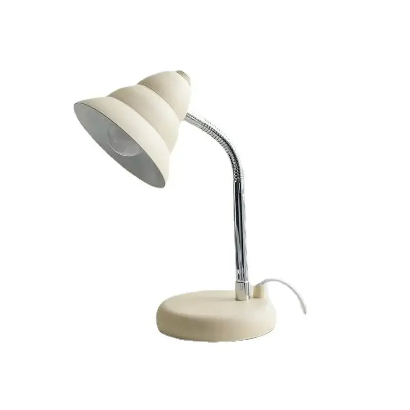 Creamy style desk lamp with a cream-colored tiered shade and chrome gooseneck arm for flexible bedroom reading light decorbites creamy