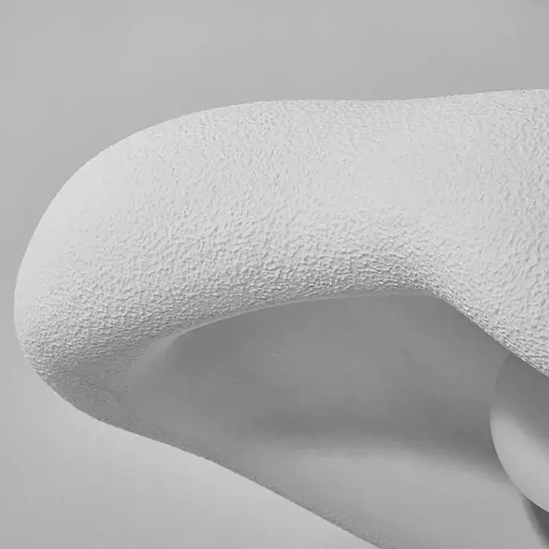 Creamy style resin pendant light with white textured sculptural organic flowing curves for dining room and kitchen island