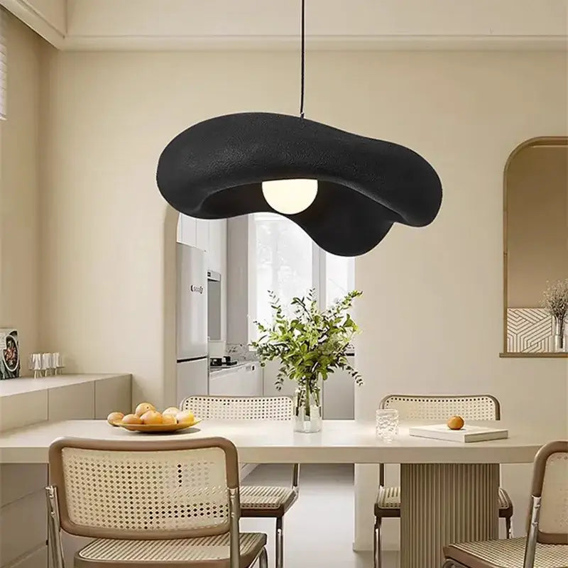 Black abstract pendant light with creamy style resin matte finish and organic cloud shape for dining room and kitchen island