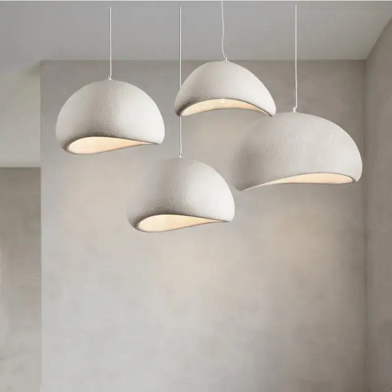 Three white textured dome-shaped creamy style wabi sabi pendant lights for stairs and living room decorbites creamy style