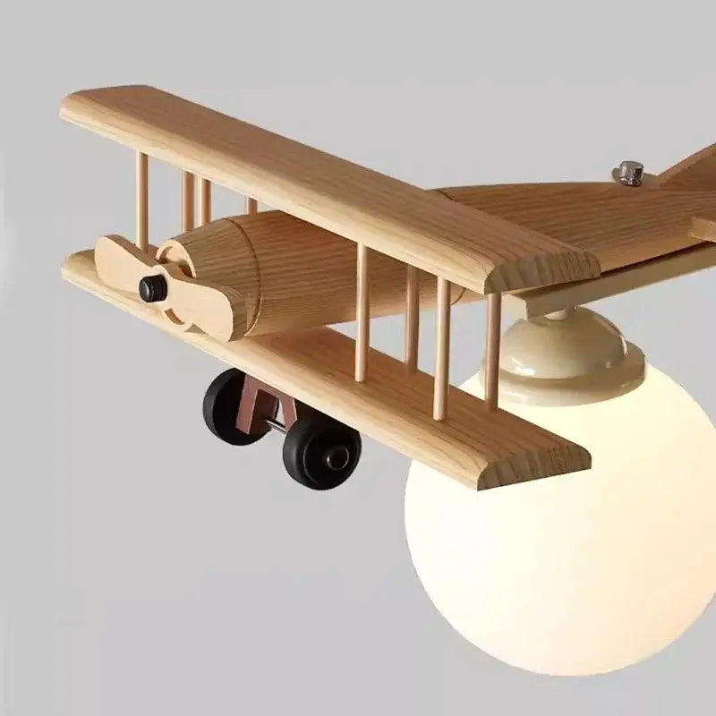 Creative airplane led wooden plane chandelier with black wheels and frosted glass bulb for boys bedroom