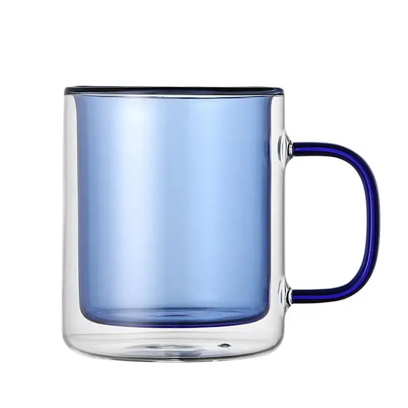 A sleek double-walled blue glass whiskey wine glass tumbler with translucent interior and dark handle for dining use