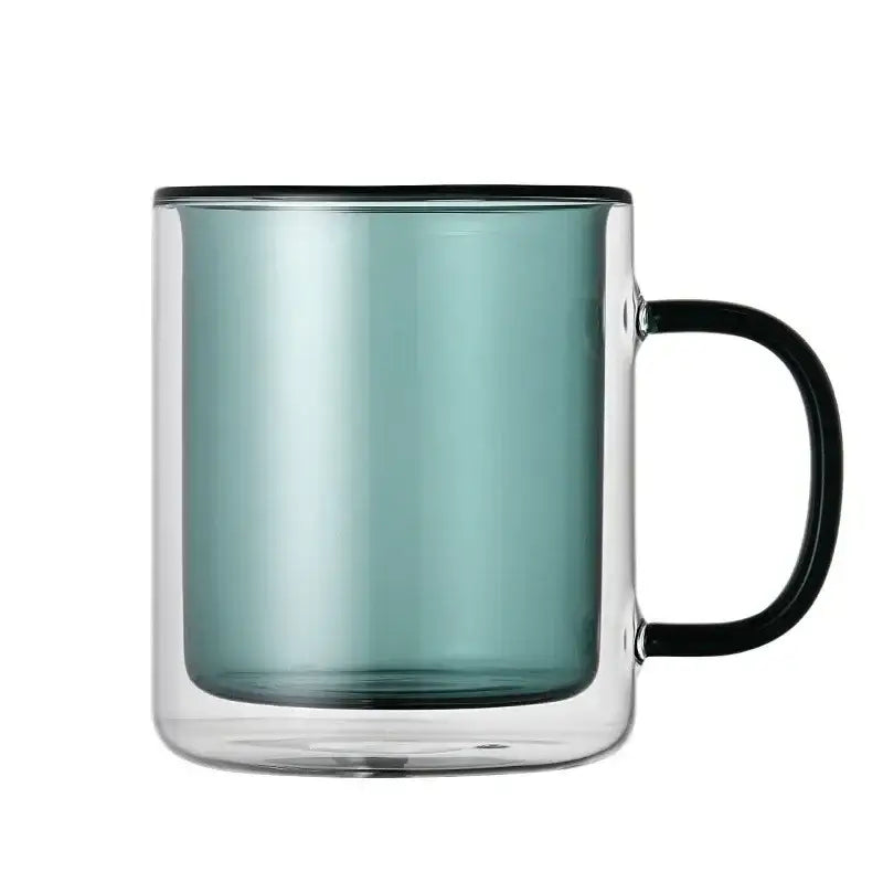 A sleek double-walled glass whiskey wine glass tumbler with teal interior and black rim and handle for dining room use