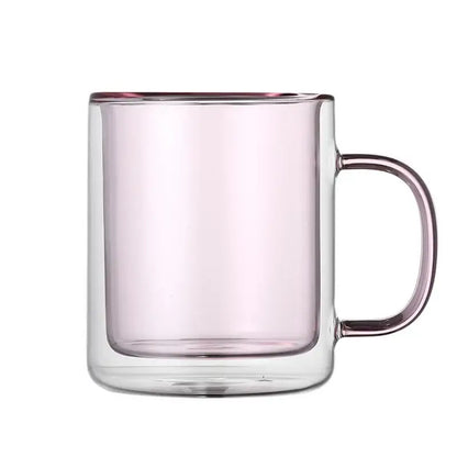 A translucent pink double-walled glass whiskey wine glass tumbler with matching handle in creative dining set
