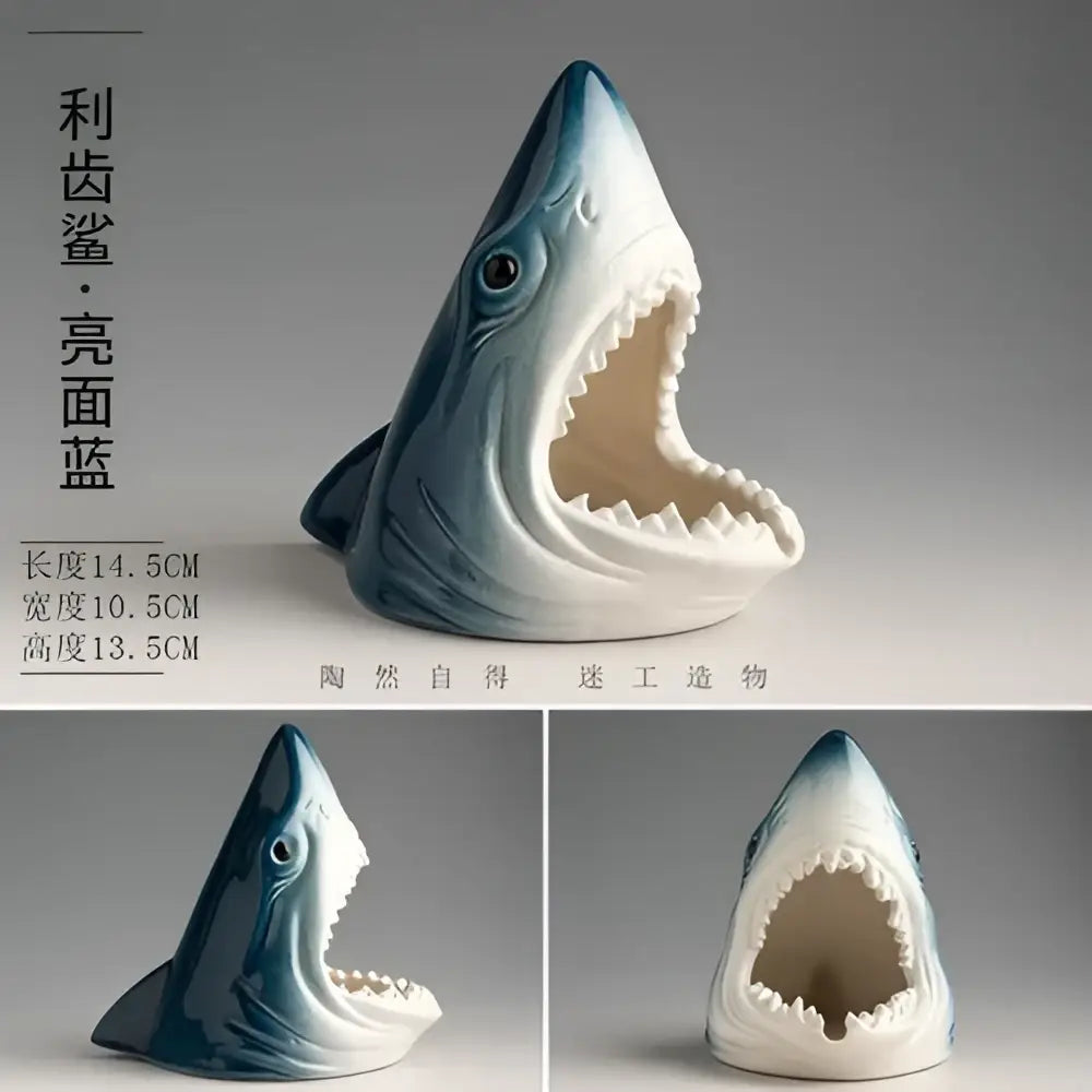 A glossy blue and white ceramic creative shark storage ashtray with wide-open mouth for living room decorbites decor