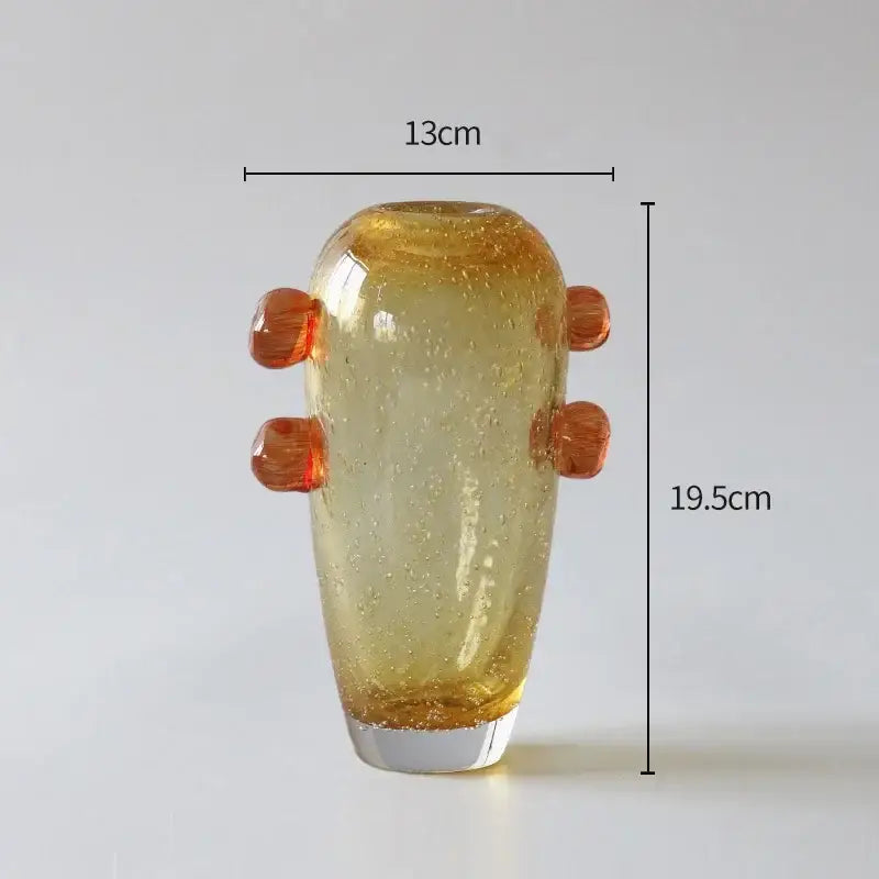 A translucent amber bubble glass vase with textured surface and four rounded orange handles for creative bubble glass decorbites creative bubble living room decor