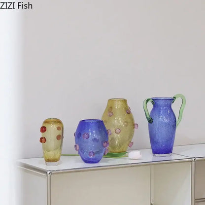 A vibrant blue creative bubble glass pitcher with green handles and textured bubbly surface for decorbites creative bubble decor